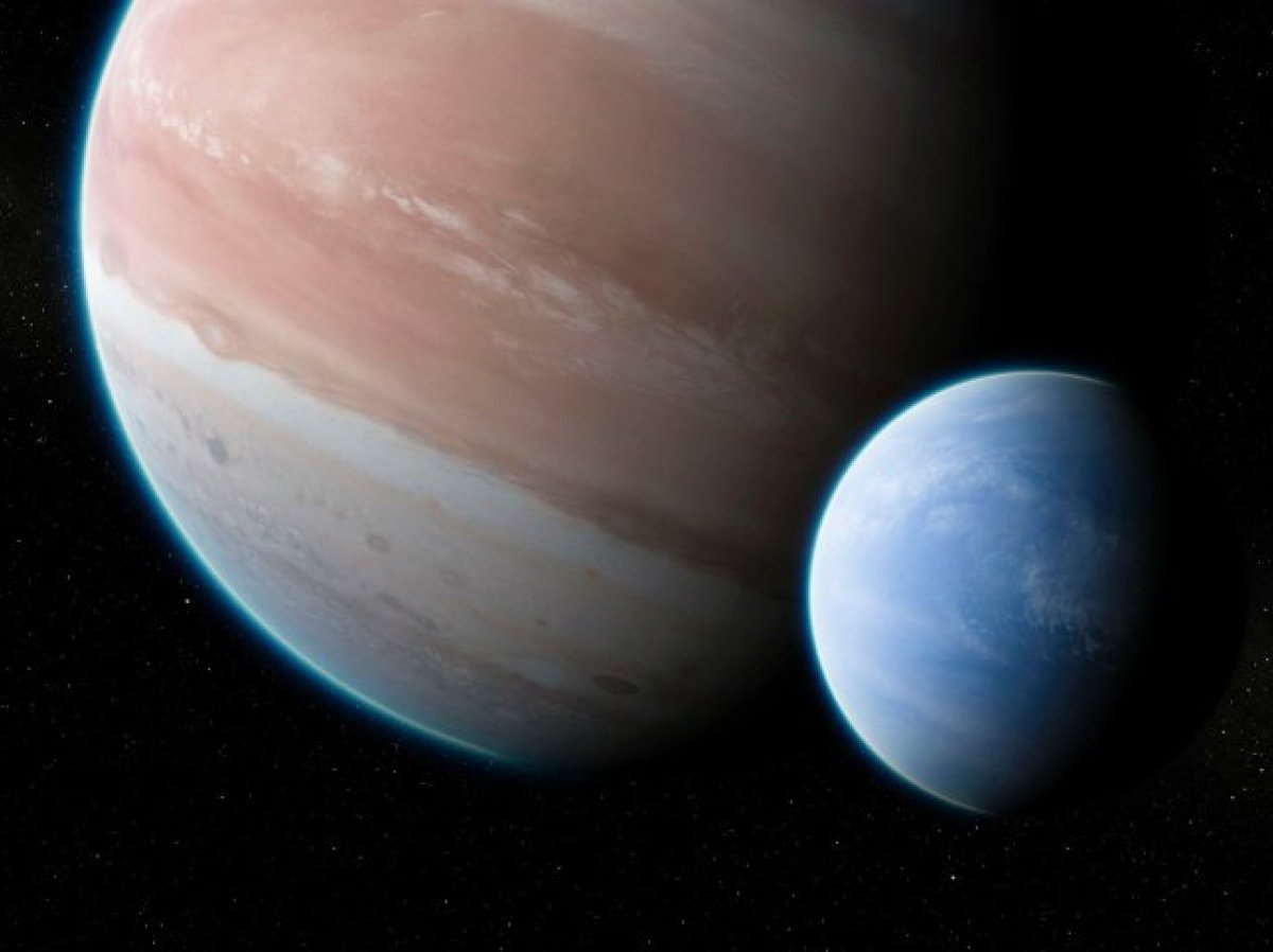 Der Exoplanet Kepler-1625b mit seinem möglichem Mond (künstlerische Darstellung)