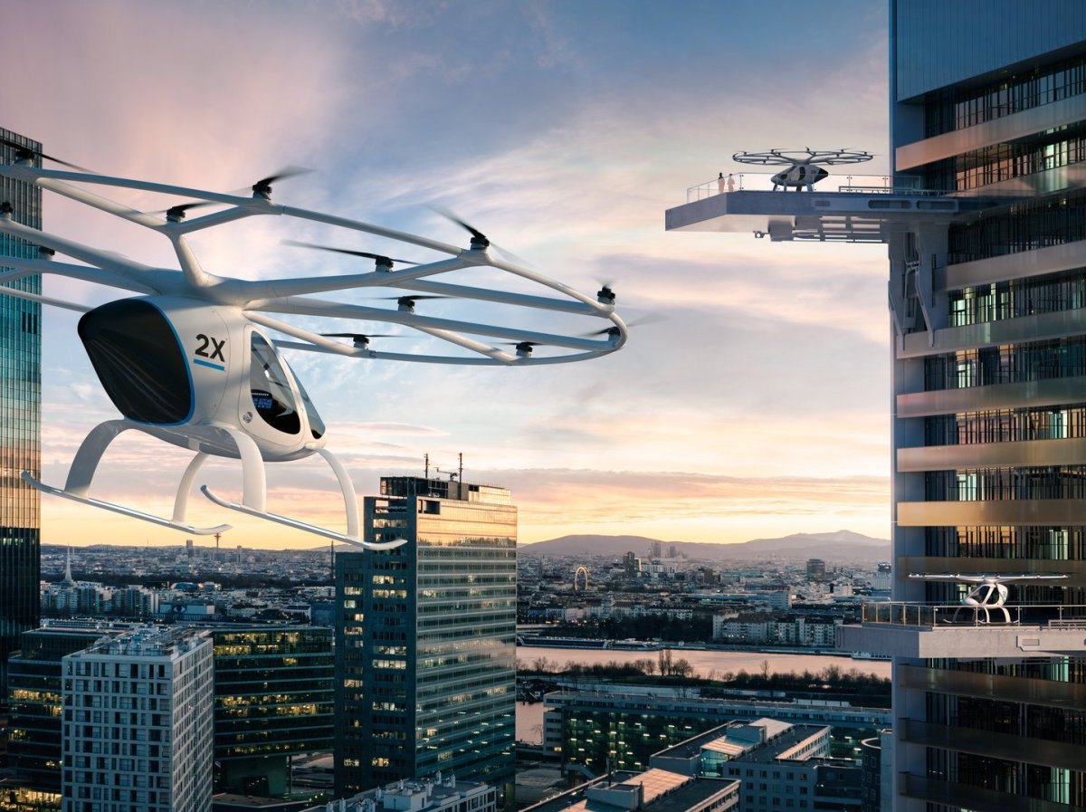 Volocopter fliegen in einer Stadt aus Hochhäusern