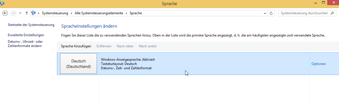 Öffnet in der "Systemsteuerung" die "Spracheinstellungen" und stellt dort die Tastatur wieder auf Deutsch um.