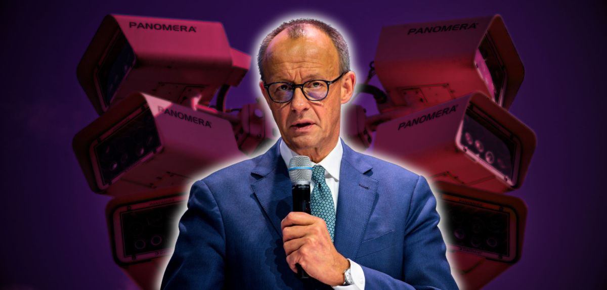 Friedrich Merz vor Überwachungskameras